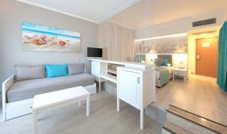 Family room with balcony or terrace