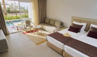 Africana Double Room Superior Swim-Up Schlafzimmer